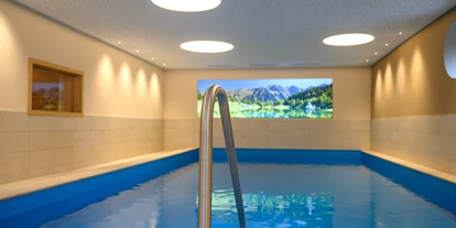 Mountainbike Urlaub - PLZ 8982 (Österreich) - Entspannen im großzügigen Hotel-Hallenbad  - Bliem`s Familienhotel
